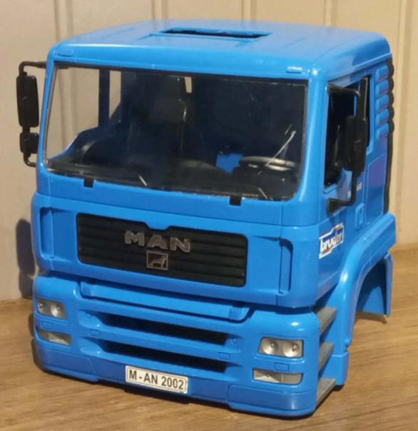 Bruder MAN TGA 41.440 cabine blauw, Kinderen en Baby's, Ophalen of Verzenden, Zo goed als nieuw