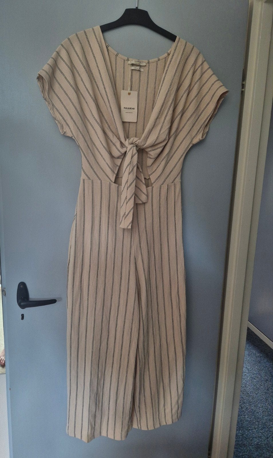 Jumpsuit pull&bear maat L, Kleding | Dames, Beige, Maat 42/44 (L), Nieuw, Ophalen of Verzenden