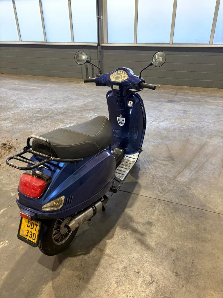 Blauwe scooter - xinix touring 2015, Ophalen, Gebruikt, Maximaal 45 km/u, Benzine