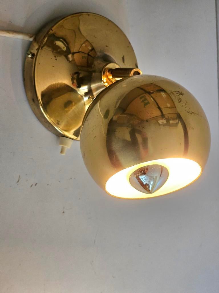 Vintage messing "Eye Ball" Guzzini wandlamp 1970., Ophalen of Verzenden