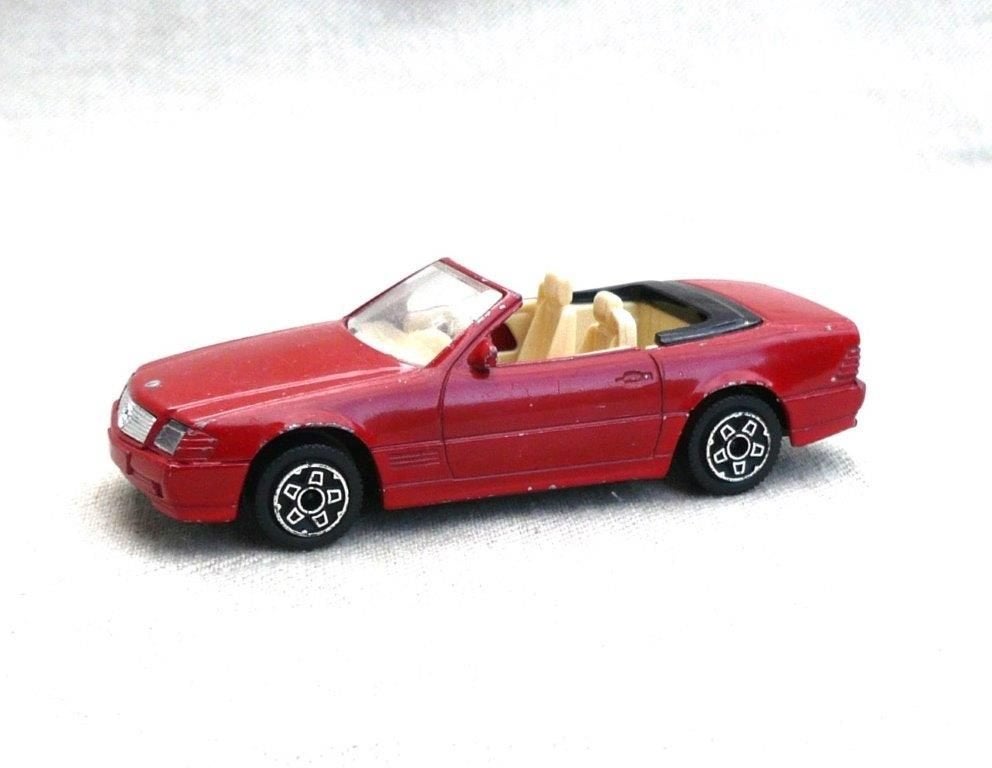 Bburago 1990 Mercedes 300SL R129 cabrio., Hobby en Vrije tijd, Modelauto's | 1:43, Ophalen of Verzenden, Zo goed als nieuw, Auto