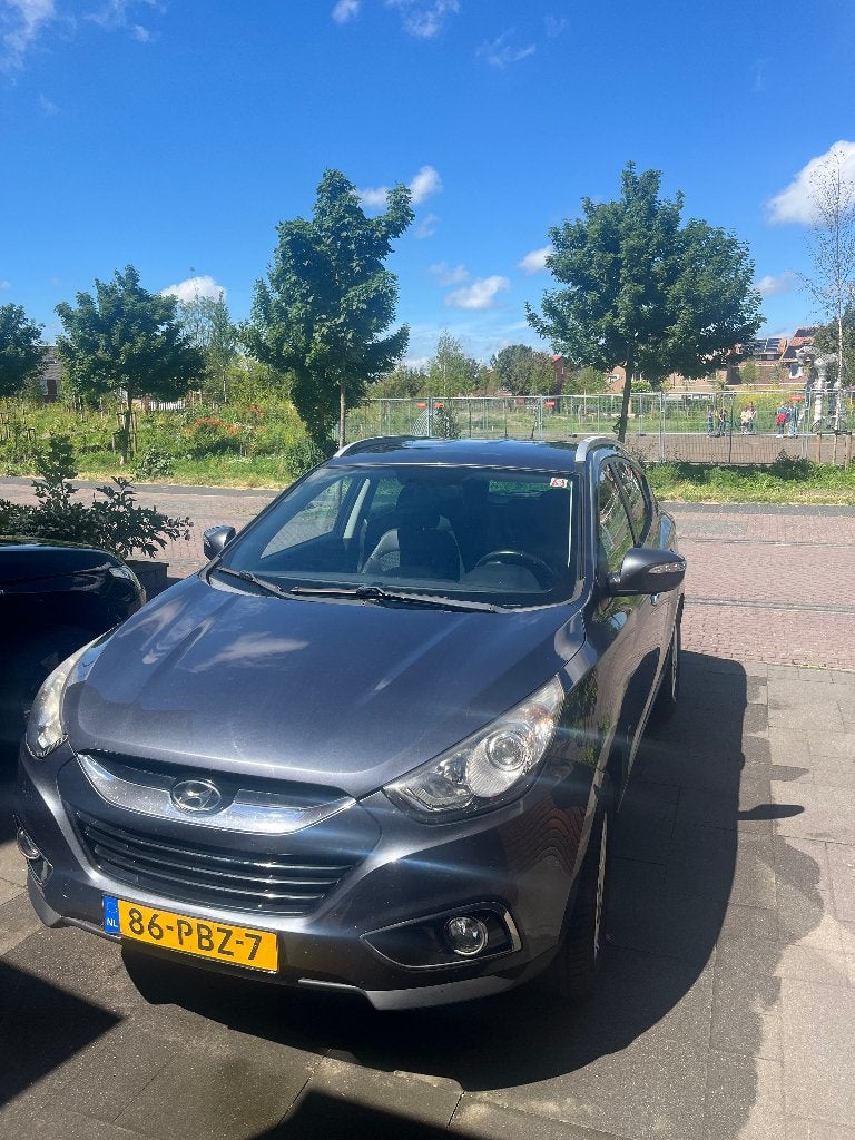 Hyundai iX35 2.0 I Cvvt 2WD AUT 2011 Grijs (KS 209000), 1998 cc, Cruise Control, Zwart, 4 cilinders