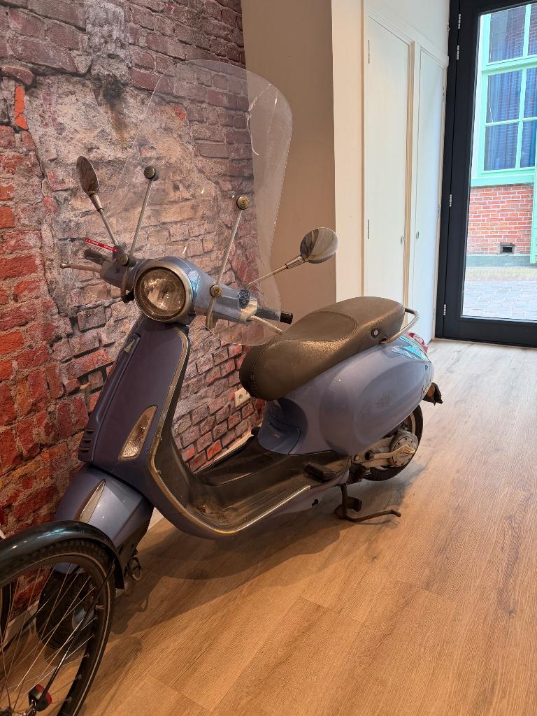 Vespa Primavera Blauw, Fietsen en Brommers, Scooters | Vespa, Ophalen, Gebruikt, Maximaal 45 km/u, Benzine