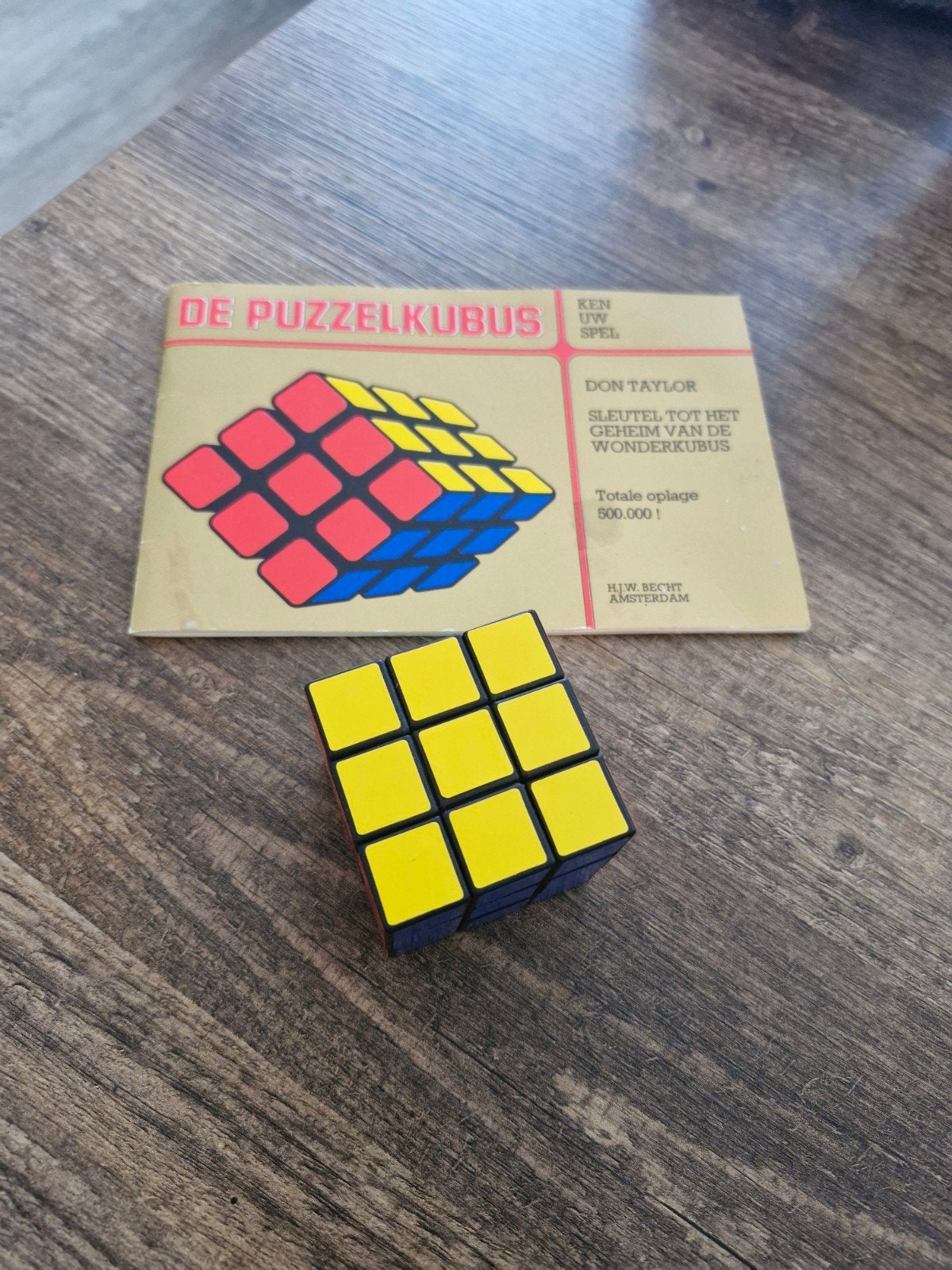 Puzzelkubus / Rubik's Cube + boekje, Ophalen of Verzenden, Minder dan 500 stukjes, Gebruikt, Puzzelboek