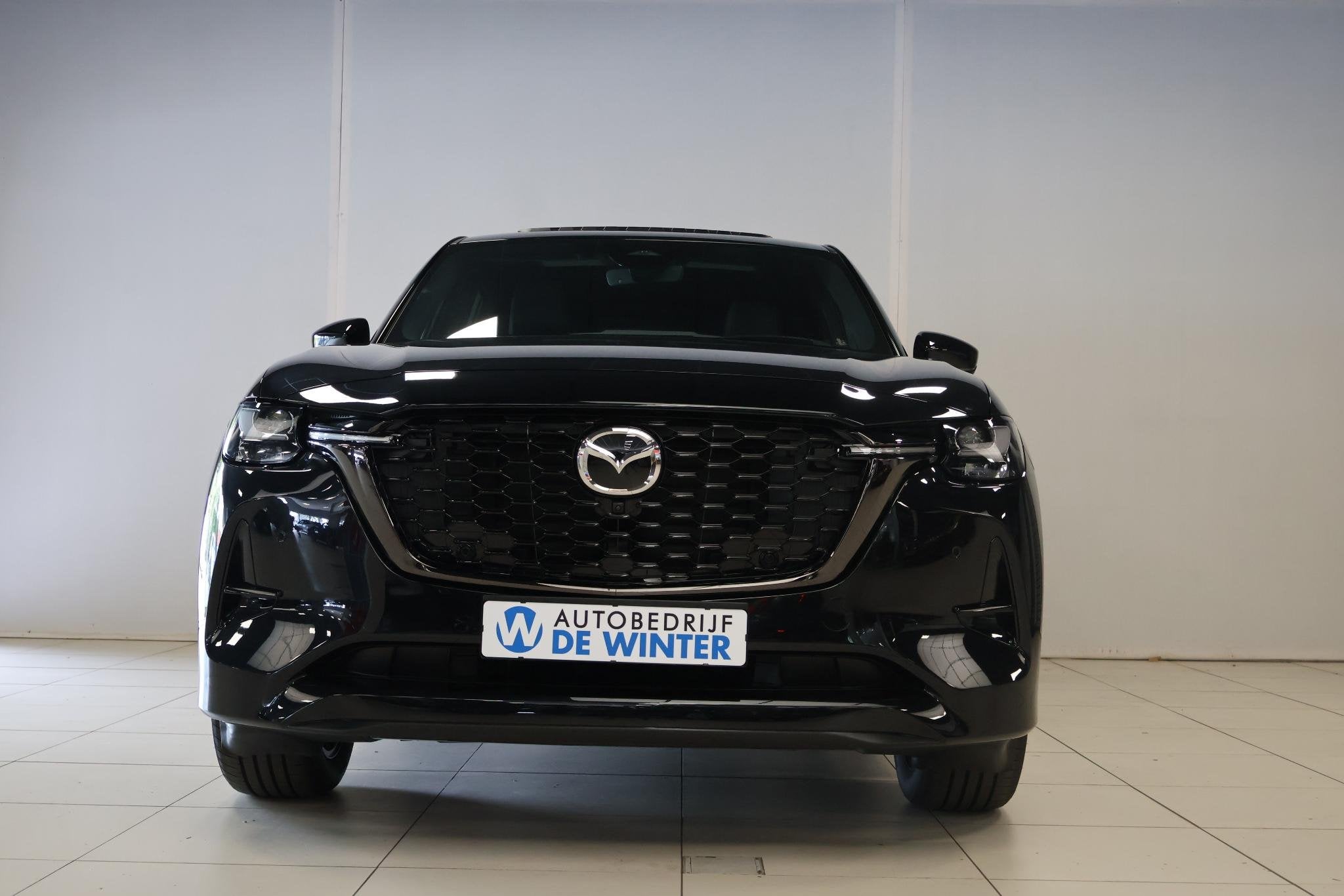 Mazda CX-60 2.5 e-SkyActiv PHEV Homura Plus, Auto's, Automaat, Gebruikt, Met garantie (alle), Zwart