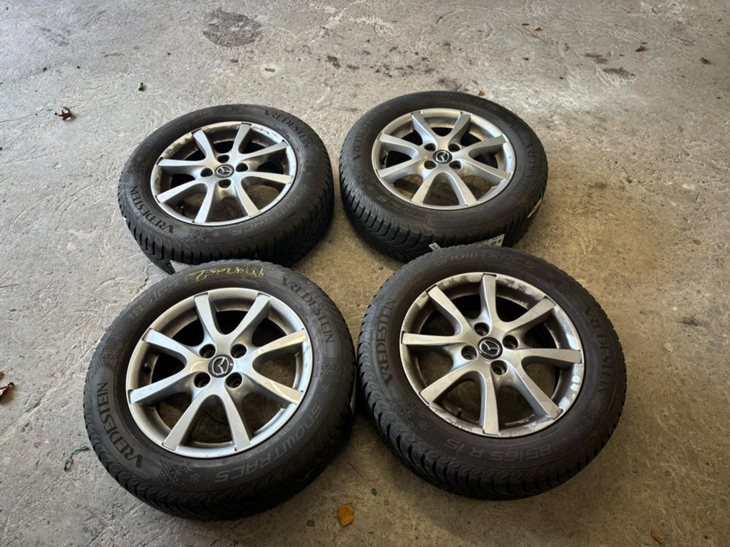 Mazda2 lichtmetalen velgen met winterband, Ophalen