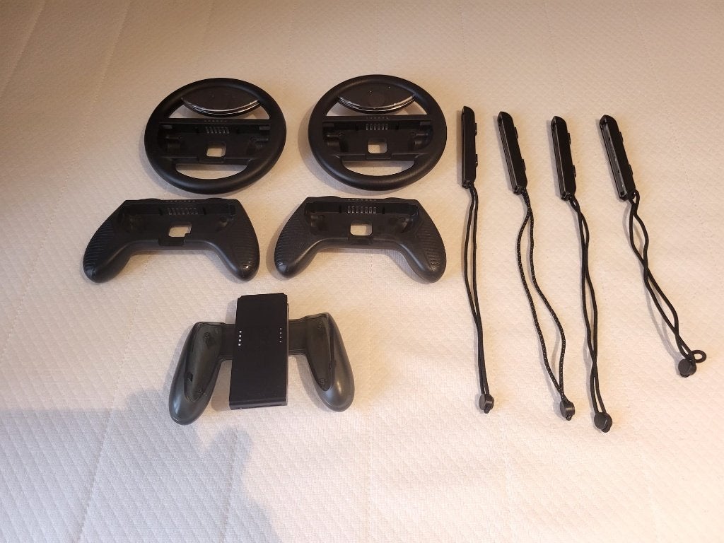 Nintendo Switch controllers: Mario Kart & Just Dance, Ophalen of Verzenden, Zo goed als nieuw, Switch, Stuurtje of Sportattribuut