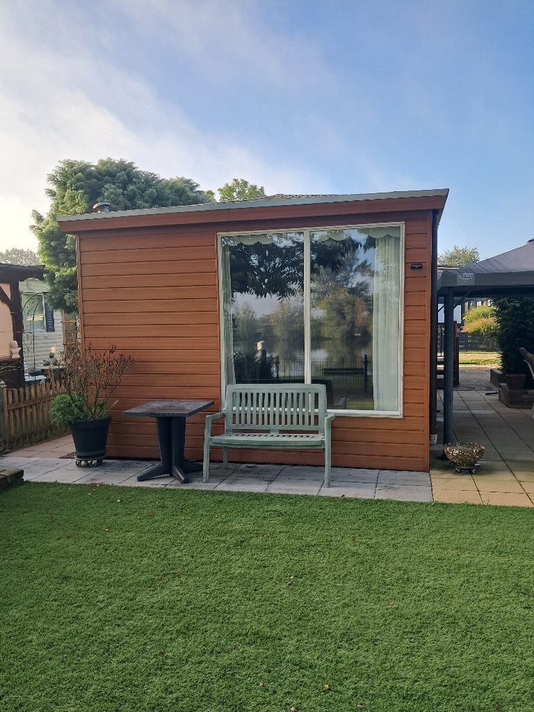 Te koop goed onderhouden chalet 11 x 4 m. zonder staanplaats, Tot en met 4