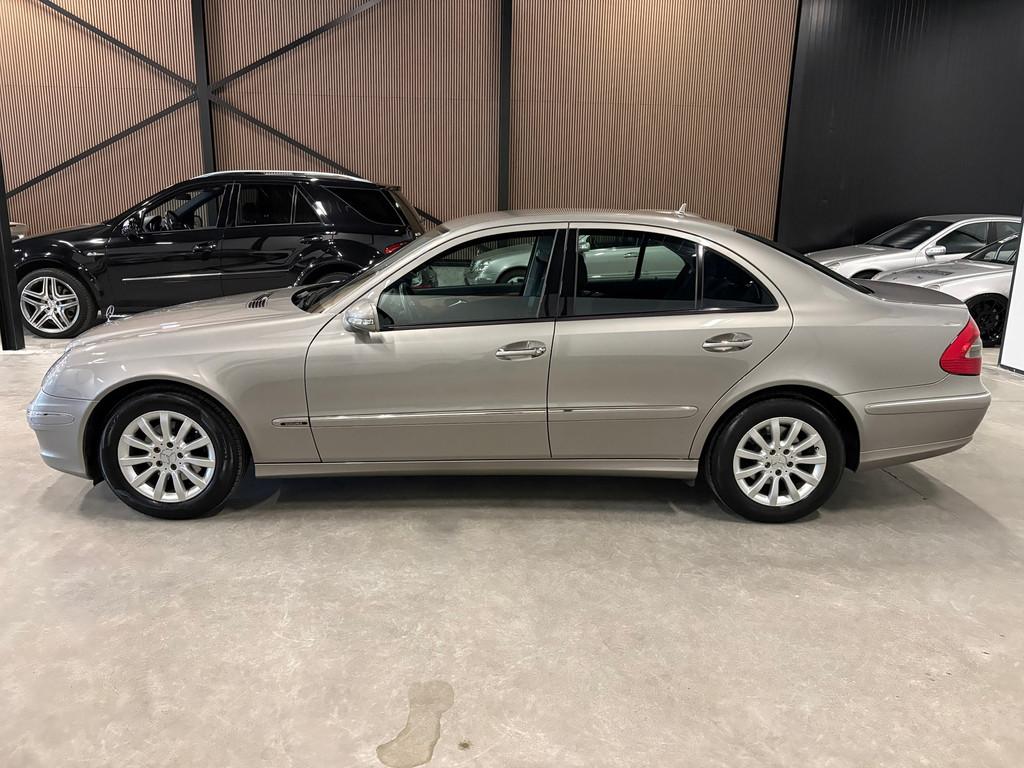 Mercedes-Benz E-klasse 200 K. Elegance Automaat W211 Facelif, Auto's, Mercedes-Benz, Automaat, Gebruikt, Zwart, 4 cilinders