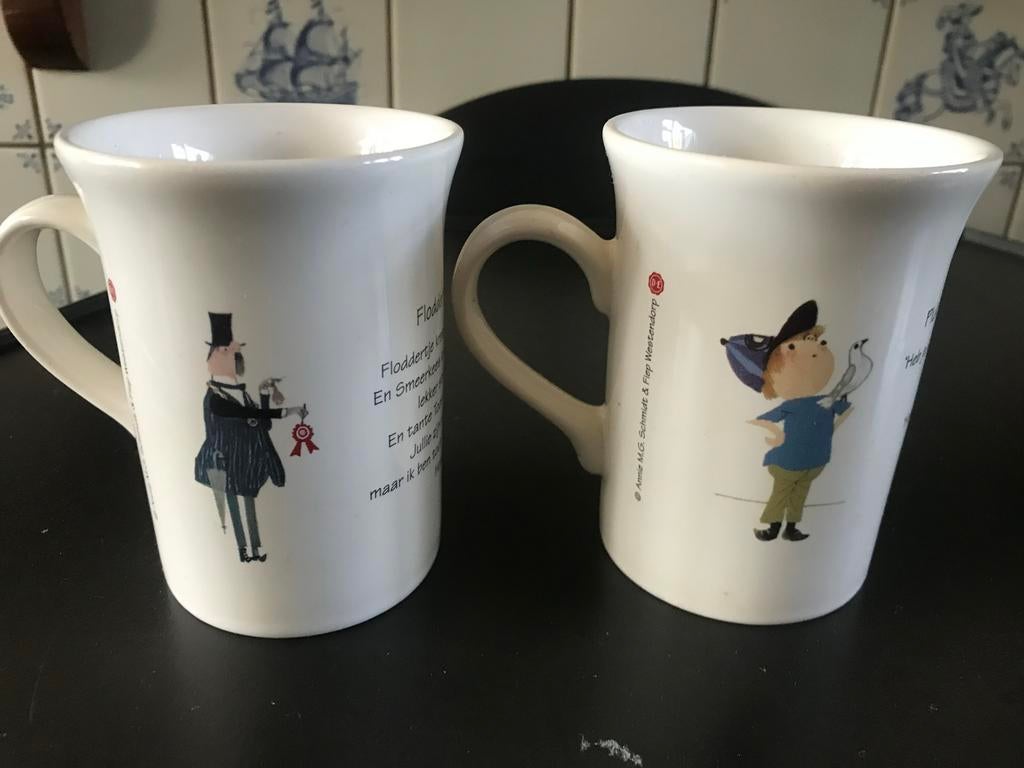 Vier bekers met illustraties van Annie M.G. Schmidt, Huis en Inrichting, Ophalen, Zo goed als nieuw