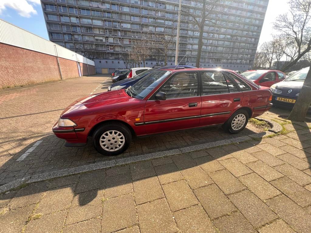 Toyota Carina 1.6 XLI LB MM U9 1992 Rood, Voorwielaandrijving, Carina, 4 cilinders, 49 €/maand