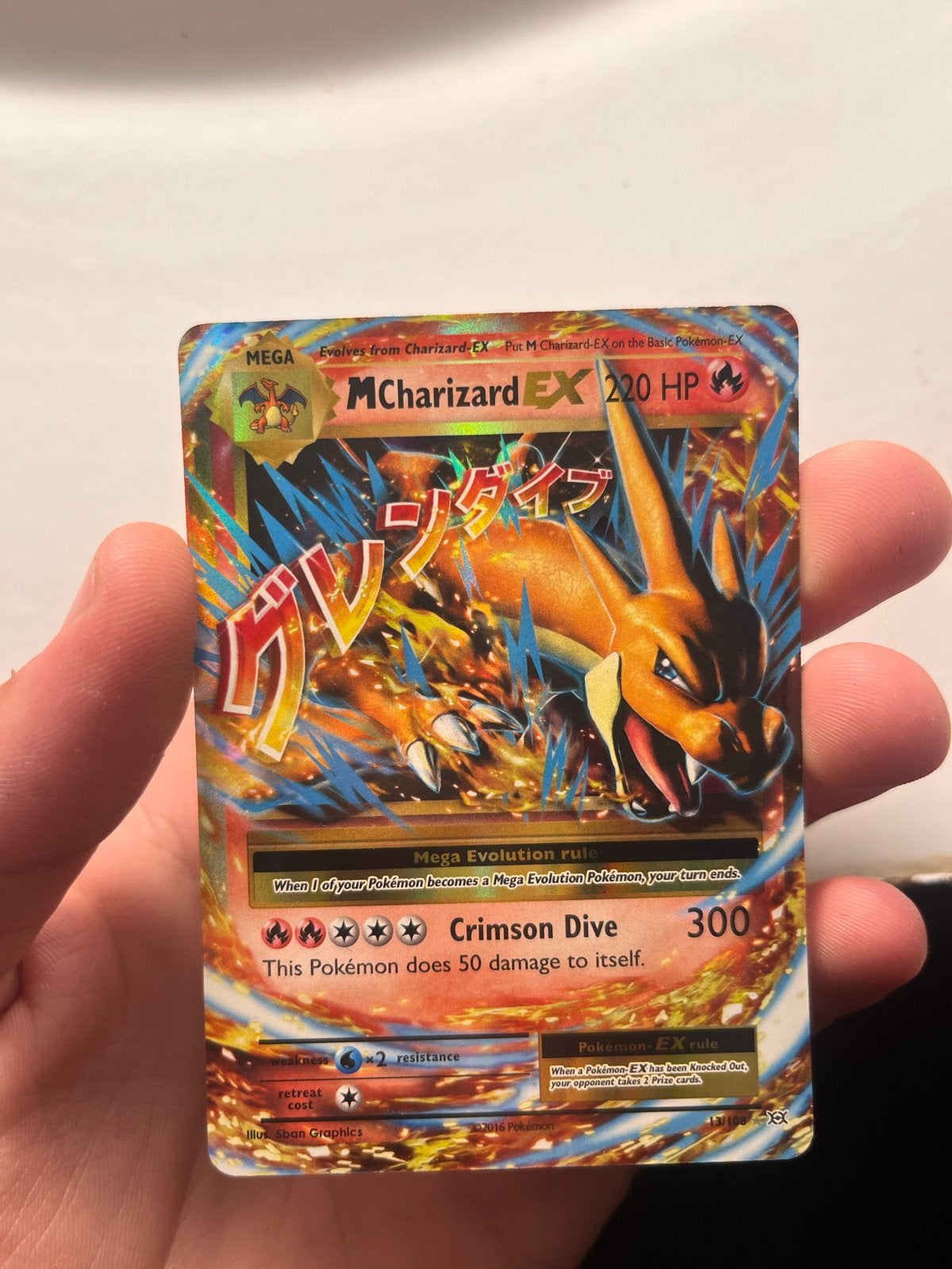 Pokémon Kaart M Charizard EX 220 HP (Crimson Dive), Ophalen of Verzenden, Zo goed als nieuw, Losse kaart, Foil