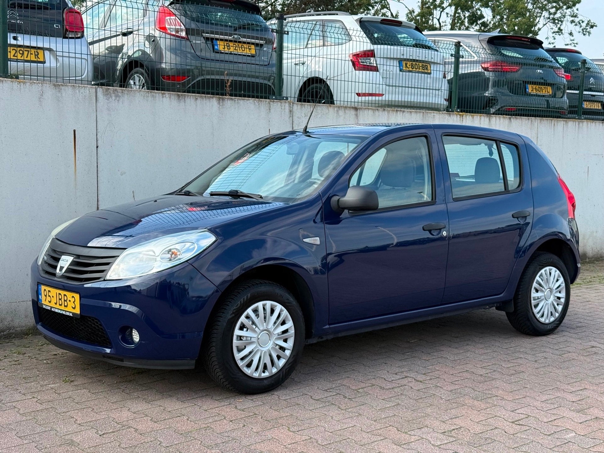 Dacia Sandero 1.2/CAMERA/APK 06-2027/124690 KM NAP/, Auto's, Voorwielaandrijving, Dealer onderhouden, Stof, Gebruikt