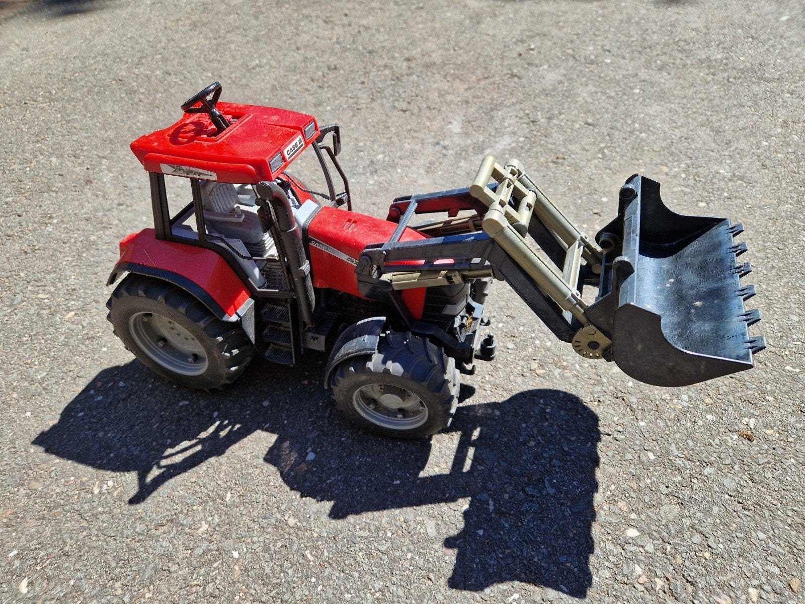 Rode speelgoedtractor met voorlader - bestuurbaar vanaf dak, Ophalen of Verzenden, Gebruikt