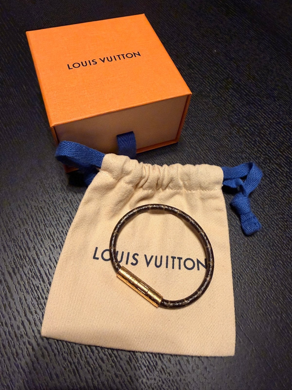 Louis Vuitton confidential bracelet, Ophalen of Verzenden, Zo goed als nieuw, Bruin, Leer