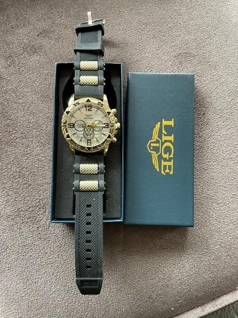 Te Koop mooi Heren Horloge Merk Lige nieuw in doos, Staal, Polshorloge, Nieuw, Kunststof