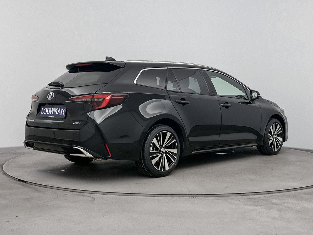 Toyota Corolla Touring Sports Hybrid 140 Dynamic *NIEUW*, Auto's, Toyota, 12 maanden, Stof, Zwart, 4 cilinders
