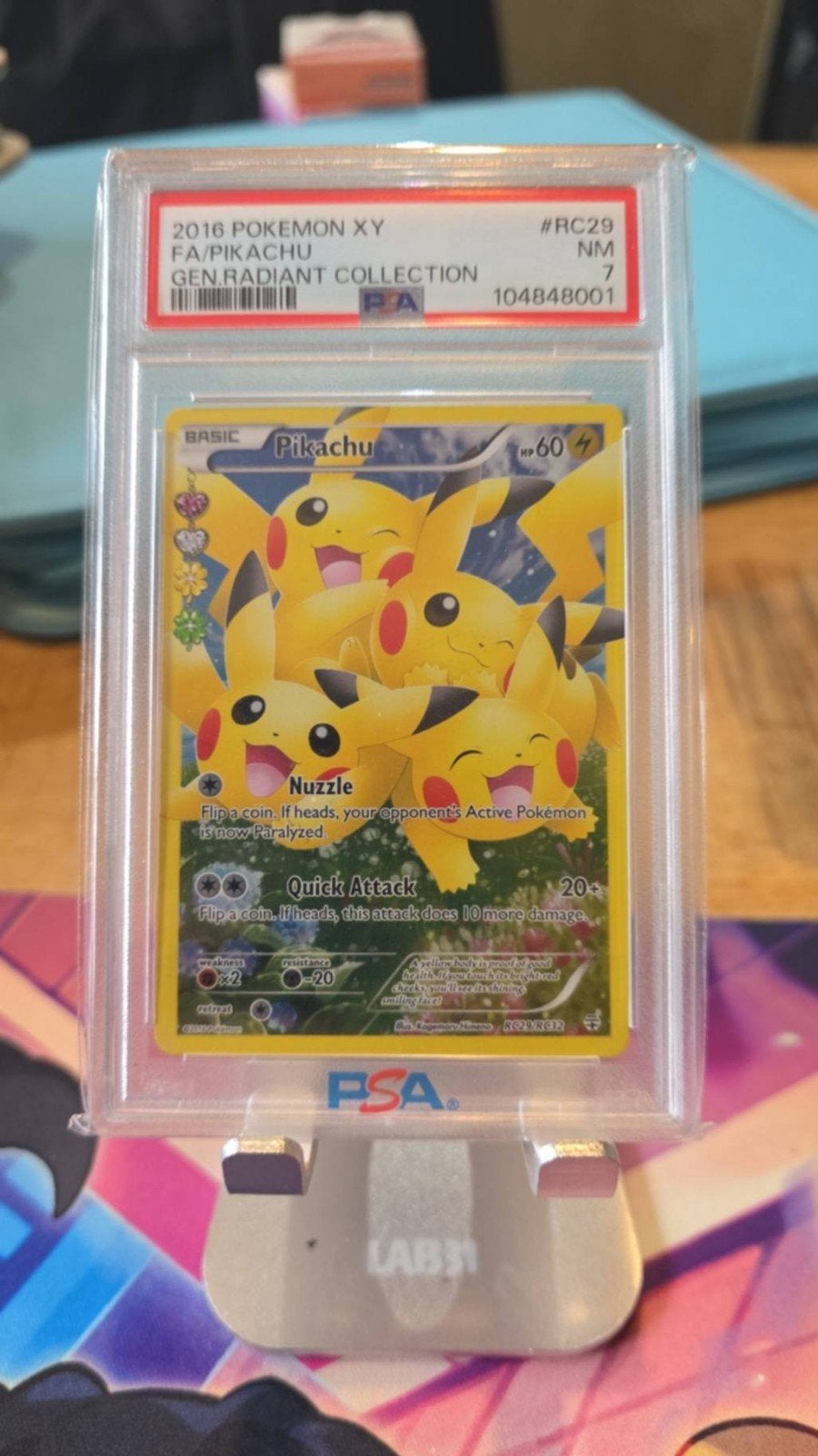 pikachu raidiant PSA 7, Ophalen of Verzenden, Zo goed als nieuw