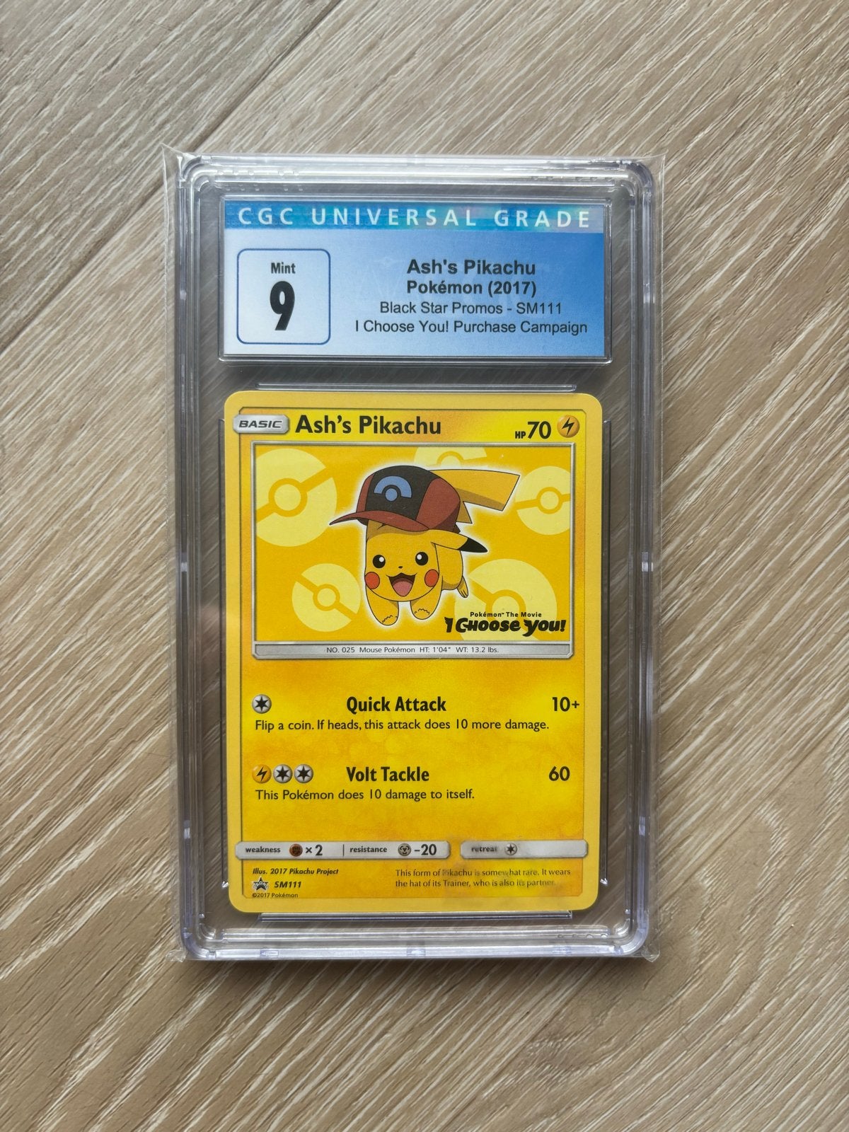 CGC 9 Ash’s Pikachu SM111 – I Choose You! Promo, Ophalen of Verzenden, Zo goed als nieuw, Losse kaart