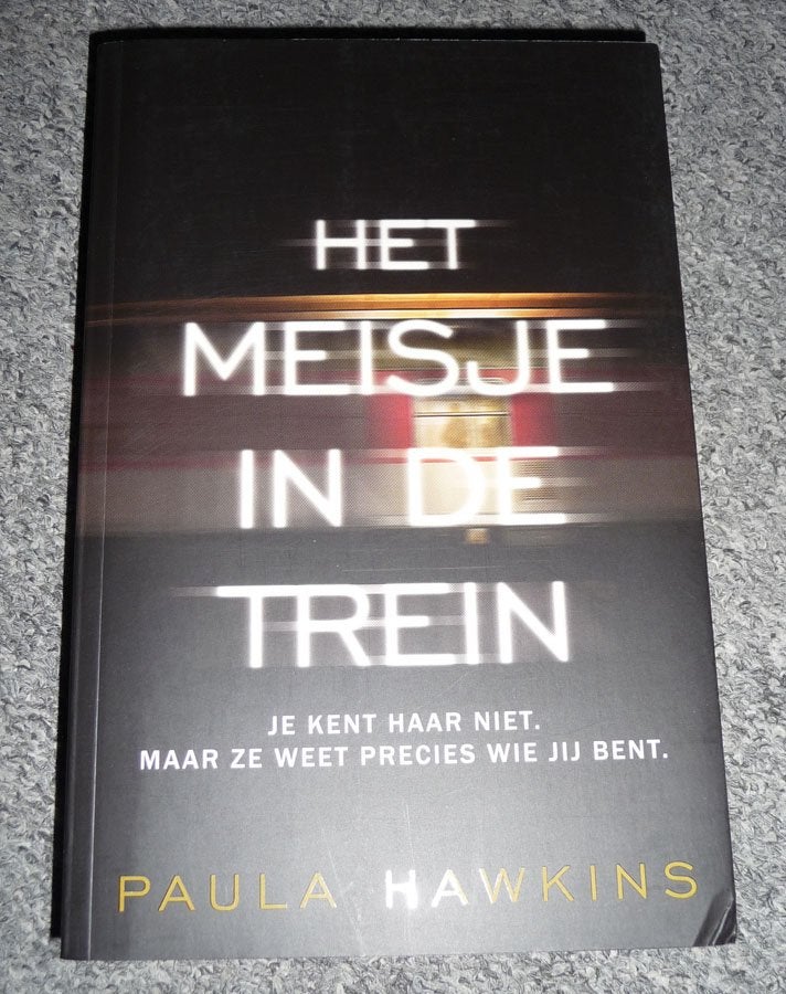 Boek PAULA HAWKINS - Het meisje in de trein, Ophalen of Verzenden, Gelezen
