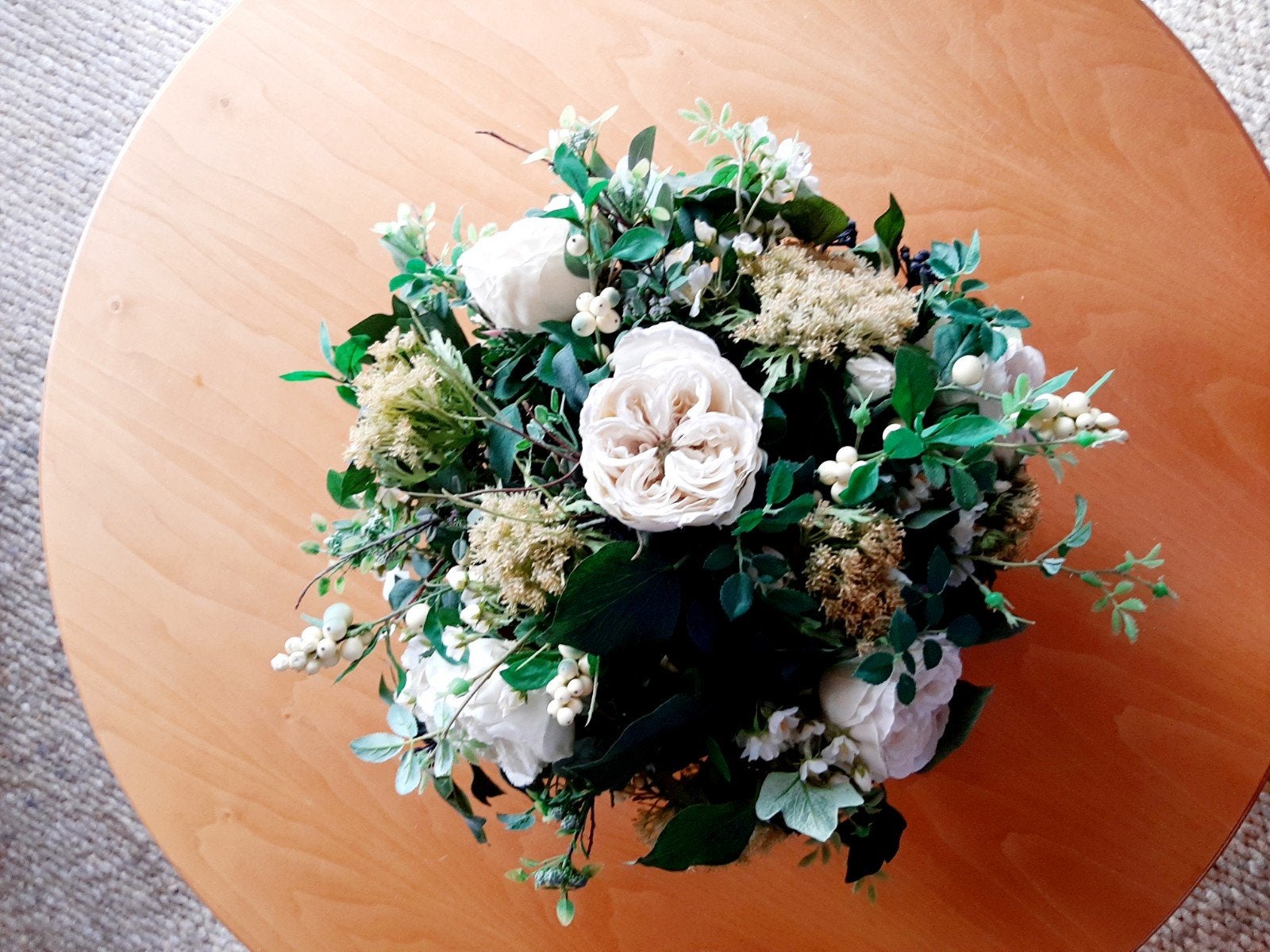 laagbloemig zijden bloemstuk, Ophalen