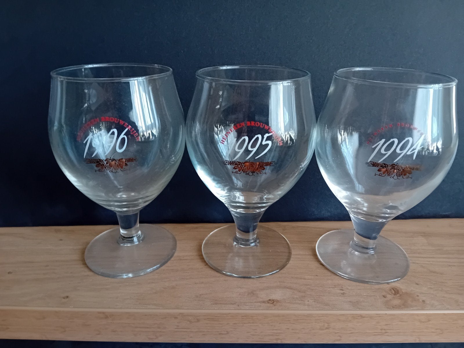 9 Heineken jaar glazen van 1994-2002, Verzamelen, Ophalen of Verzenden, Zo goed als nieuw, Glas of Glazen, Heineken