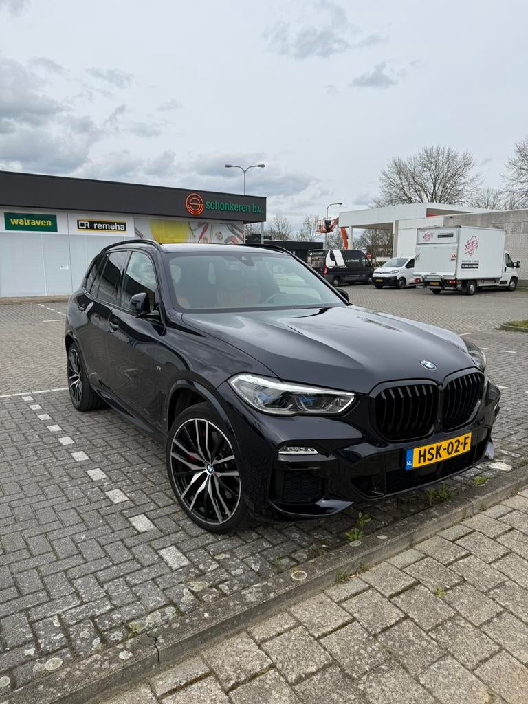 BMW X5 Xdrive45e 394pk Aut 2021 high executive M, Auto's, BMW, X5, Blauw, Vierwielaandrijving, 2998 cc