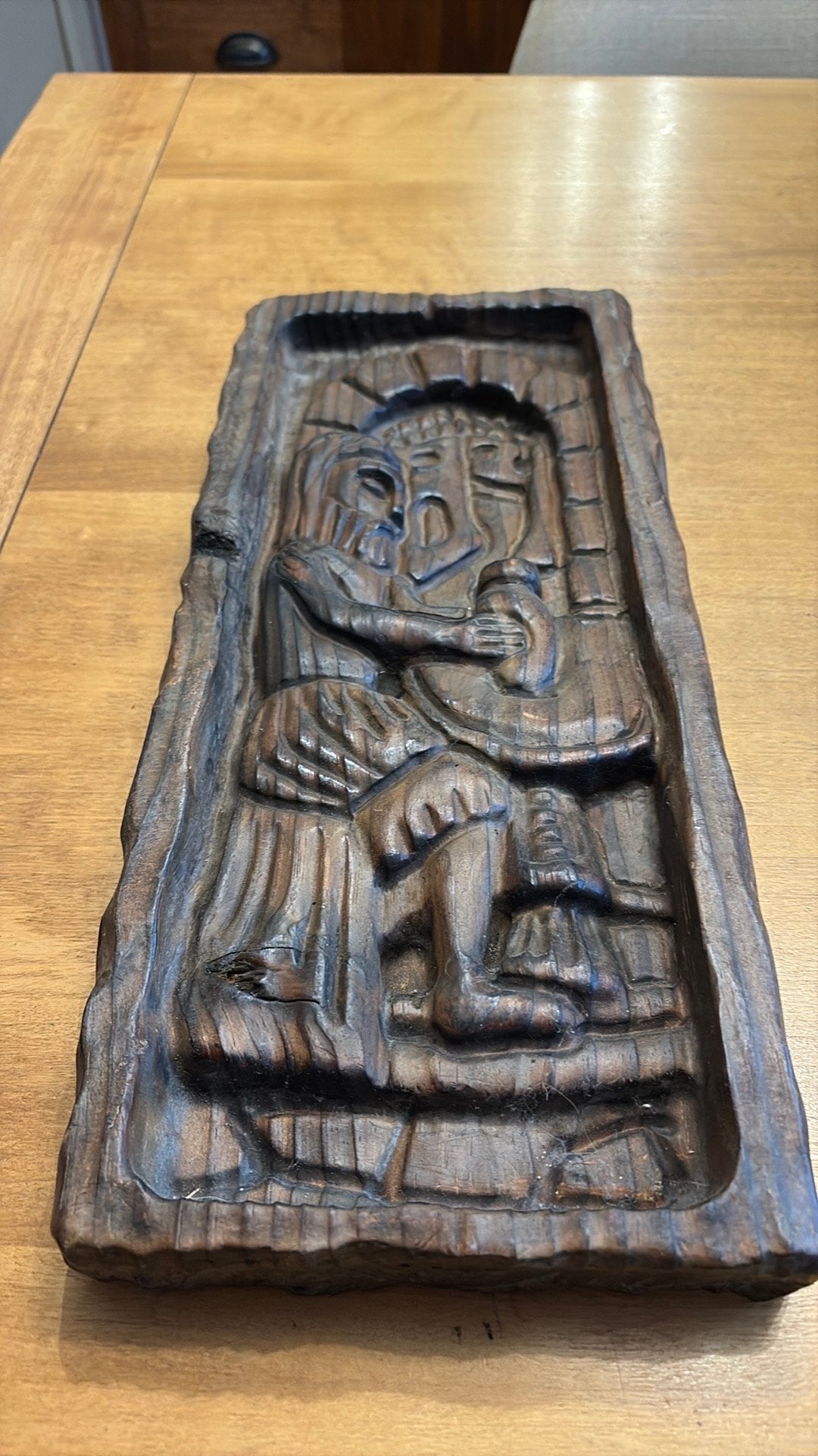 Houten speculaasplank, Ophalen