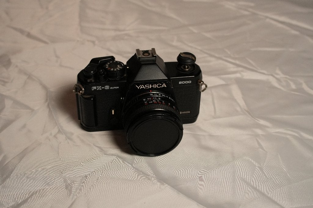 Yashica FX-3 Super Analoge Filmcamera, Ophalen of Verzenden, Niet werkend, Spiegelreflex, Overige Merken