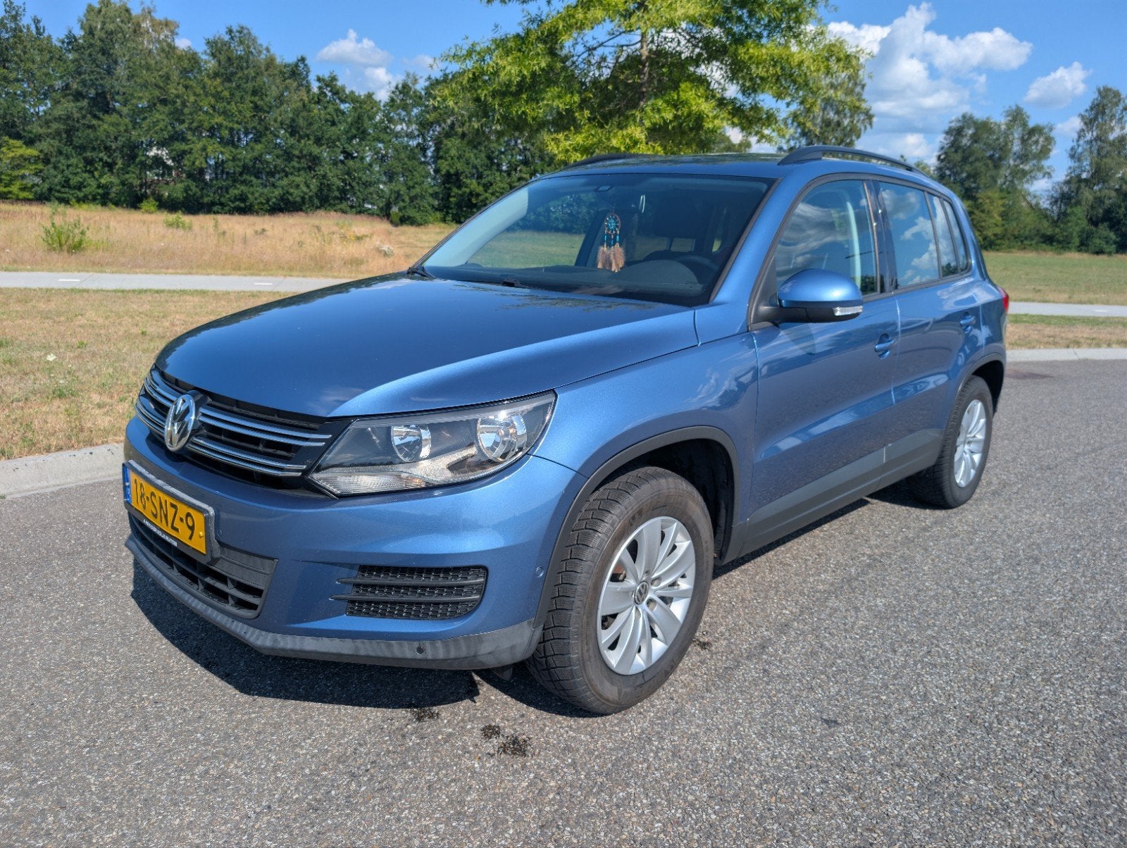 Volkswagen Tiguan 1.4 TSI 90KW facelift Blauw MET NIEUWE APK, Auto's, Voorwielaandrijving, 15 km/l, 4 cilinders, Blauw