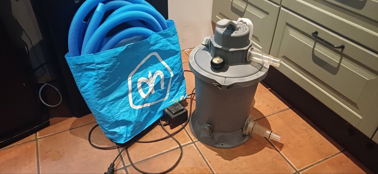 zandfilterpomp voor zwembad, Ophalen