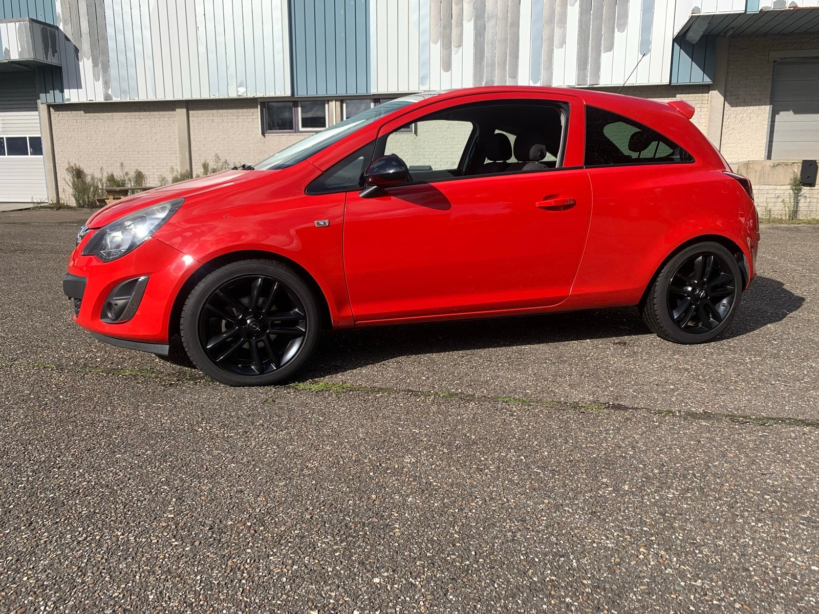 Opel Corsa 1.4 64KW 3D 2013 Rood, Voorwielaandrijving, 40 €/maand, 1398 cc, Handgeschakeld