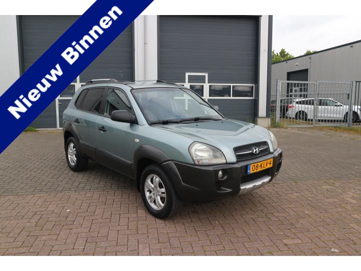Hyundai Tucson 2.0i Dynamic Cross (bj 2010), Auto's, Hyundai, Stof, Gebruikt, Zwart, 4 cilinders