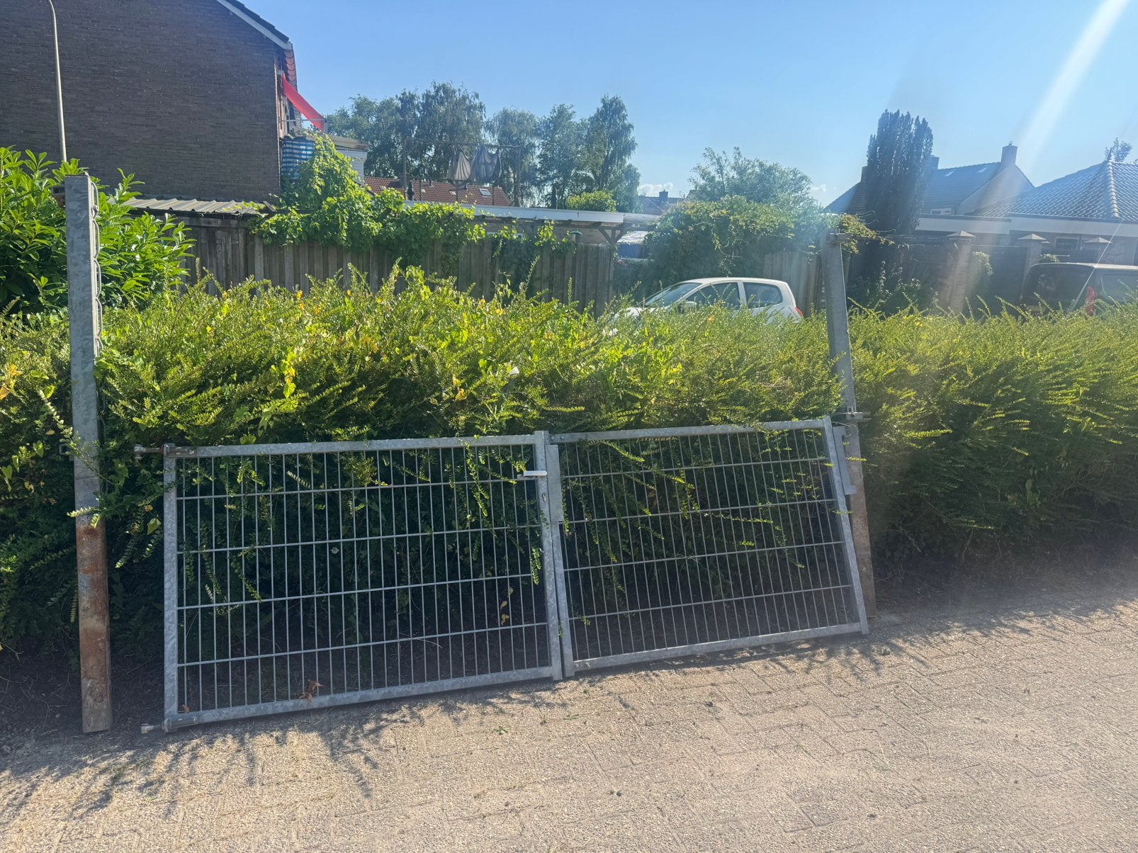 RVS hekwerk met slot., Ophalen of Verzenden, Zo goed als nieuw, IJzer