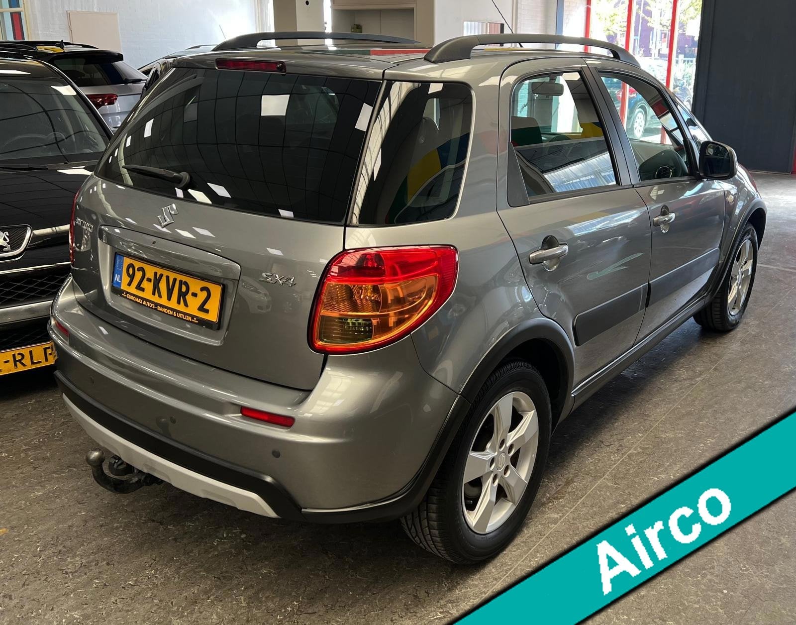 Suzuki SX4 1.6 Exclusive 2e Eigenaar - NAP - Trekhaak, Auto's, Voorwielaandrijving, Euro 5, Stof, Gebruikt