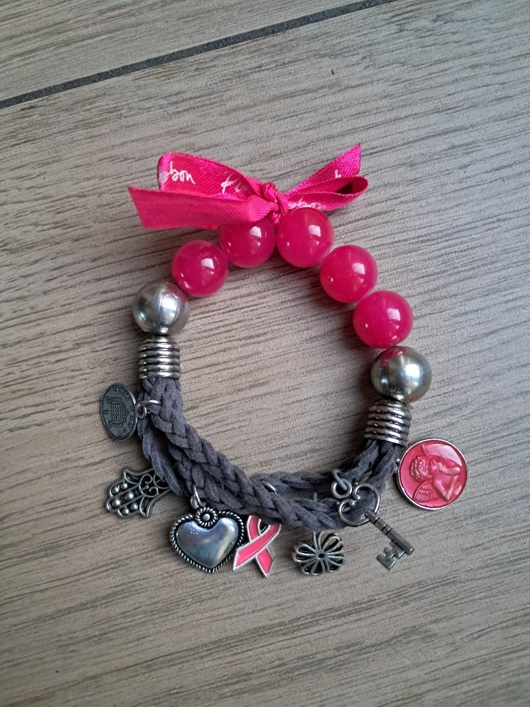 N13 Grijs/roze armband Pink Ribbon, Sieraden, Tassen en Uiterlijk, Armbanden, Kunststof of Plastic, Ophalen of Verzenden, Zo goed als nieuw