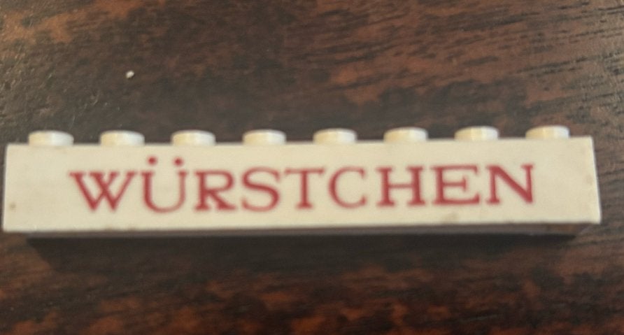 Oude jaren '50 LEGO steen met 'Würstchen' opdruk, Ophalen of Verzenden, Gebruikt, Overige merken