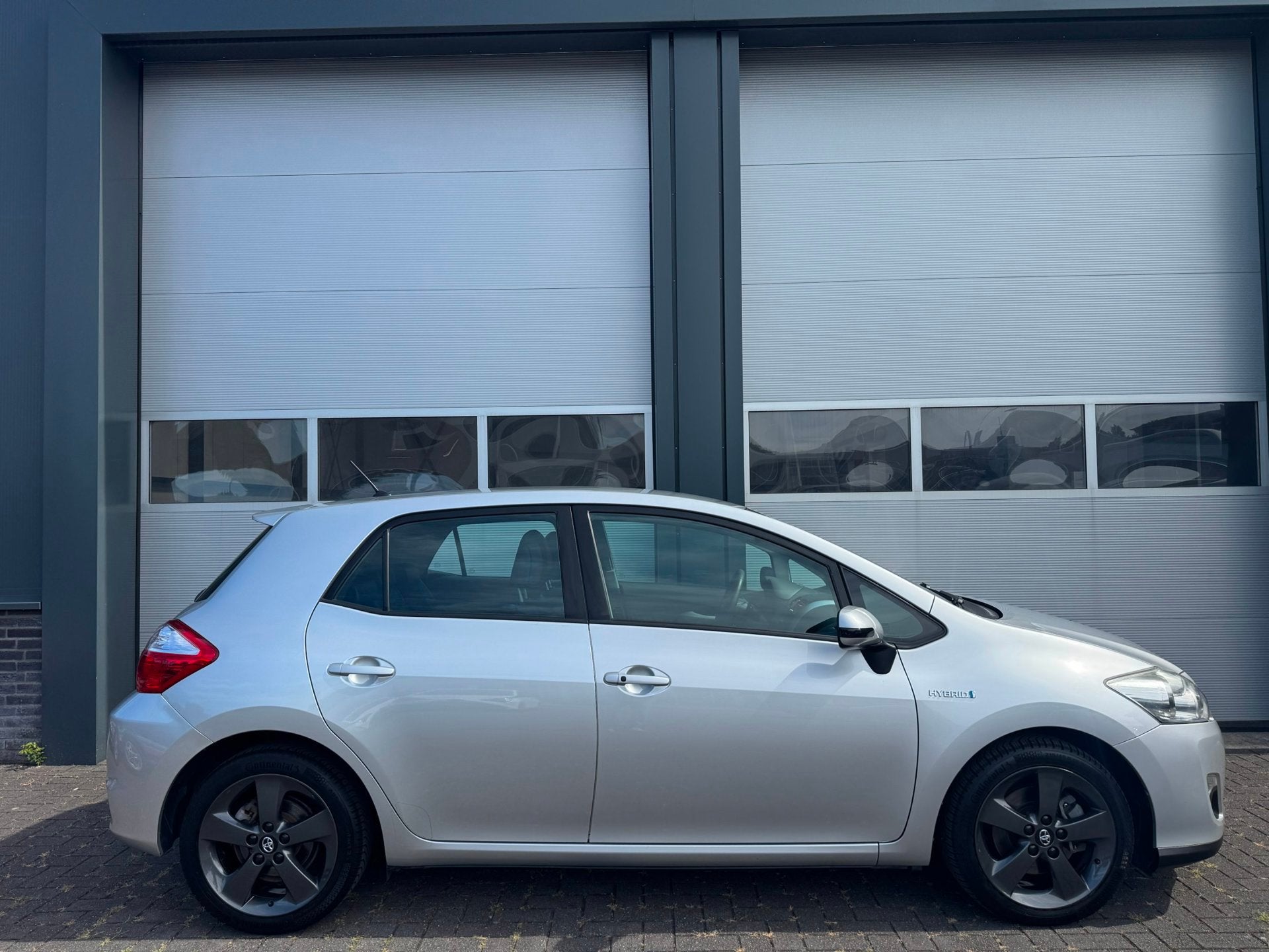 Toyota Auris 1.8 Full Hybrid Executive Half-leer Navi Camera, Euro 5, Gebruikt, Parkeersensor, 4 cilinders