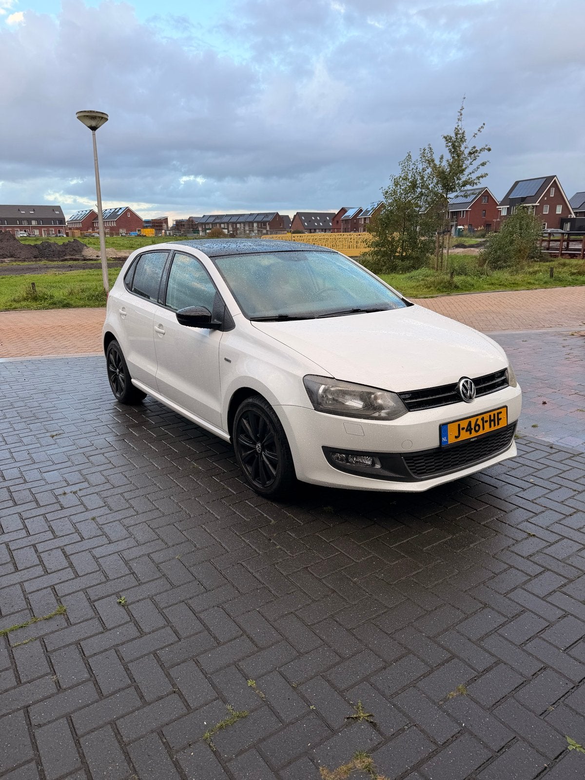 Volkswagen Polo 1.2 TSI 66KW 2013 Wit, Auto's, Voorwielaandrijving, Stof, 40 €/maand, Zwart