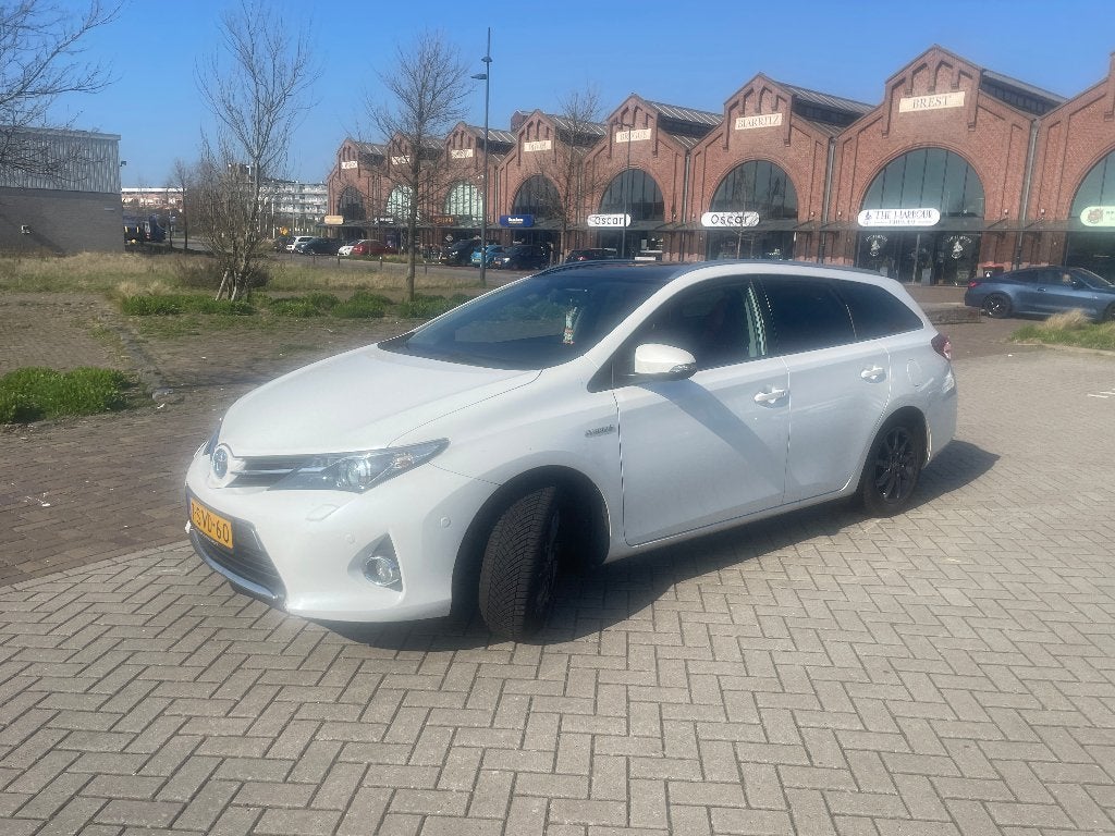 Toyota Auris 1.8 Hybrid Touring Sports CVT 2014 Wit, Auto's, Euro 5, Wit, Grijs, 1798 cc
