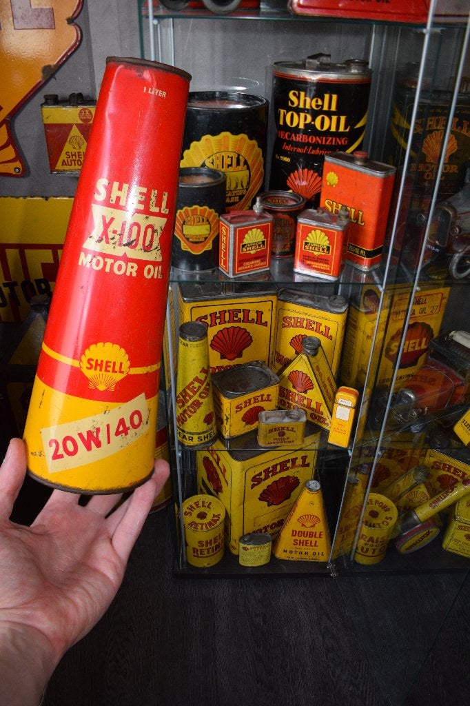 zeldzame shell conische olie blik van 1 liter 1950, Ophalen of Verzenden, Gebruikt, Reclamebord