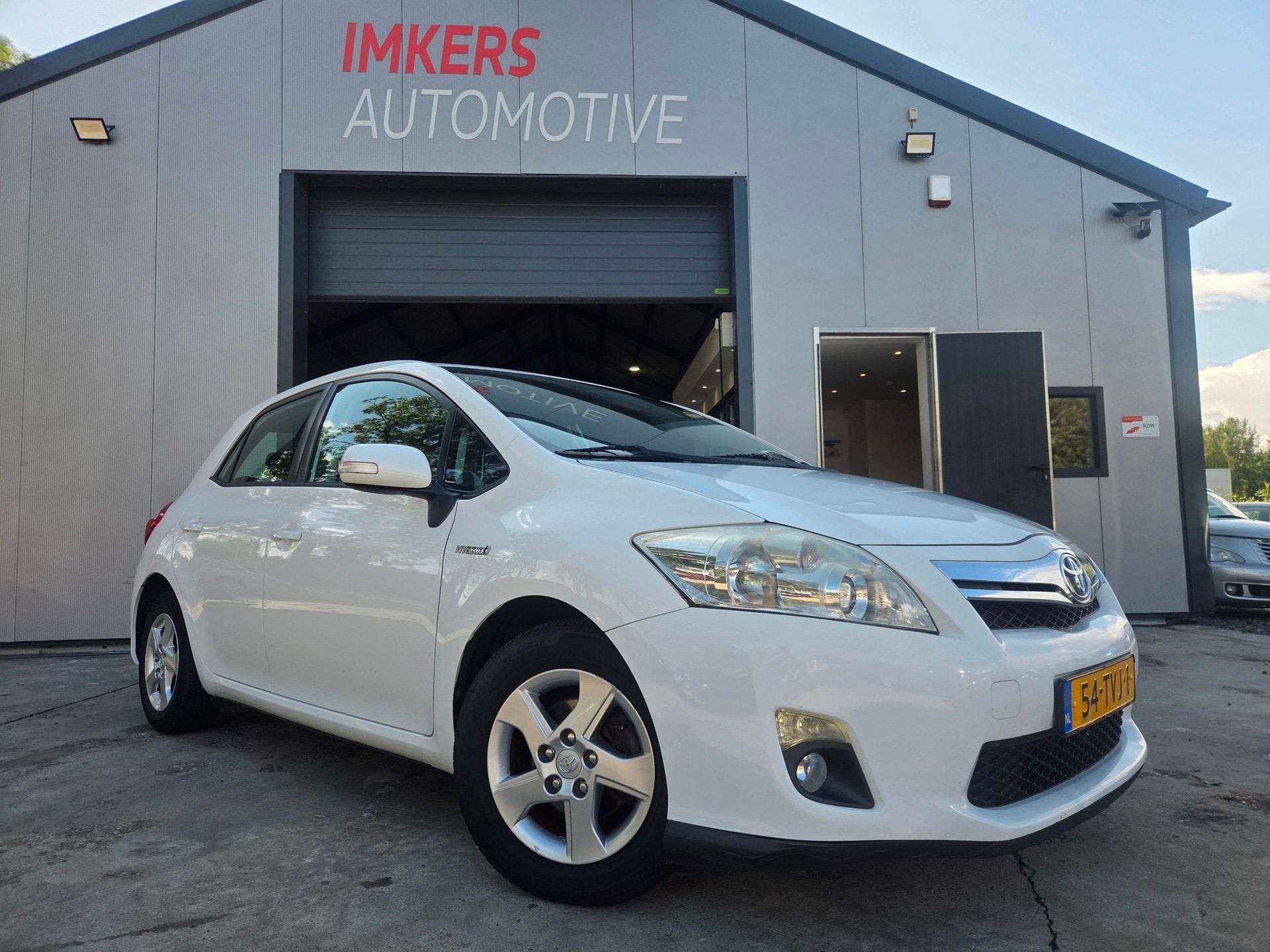 Toyota Auris 1.8 Full Hybrid Business, Auto's, Toyota, Euro 5, Stof, Gebruikt, Zwart