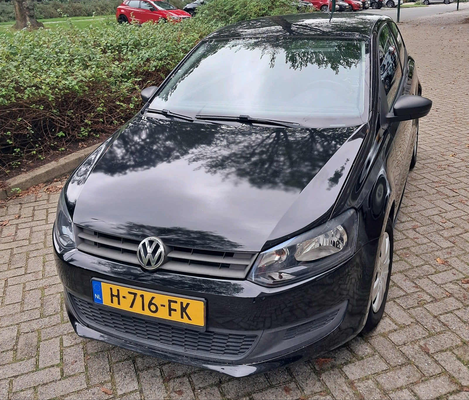 Volkswagen Polo 1.2 uit 2012 Zwart, 169.193 KM, Airco, Voorwielaandrijving, 967 kg, 40 €/maand, 1198 cc