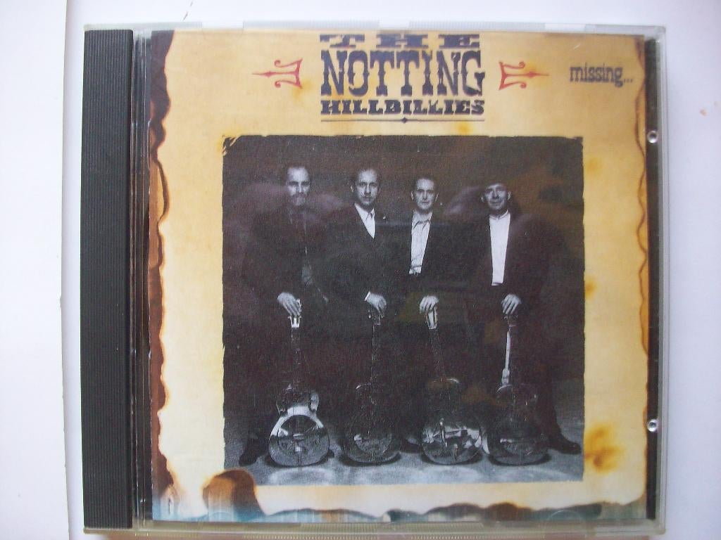 cd THE NOTTING HILLBILLIES - Missing Presumed Having A Good, Cd's en Dvd's, Ophalen of Verzenden, 1980 - 1989, Zo goed als nieuw
