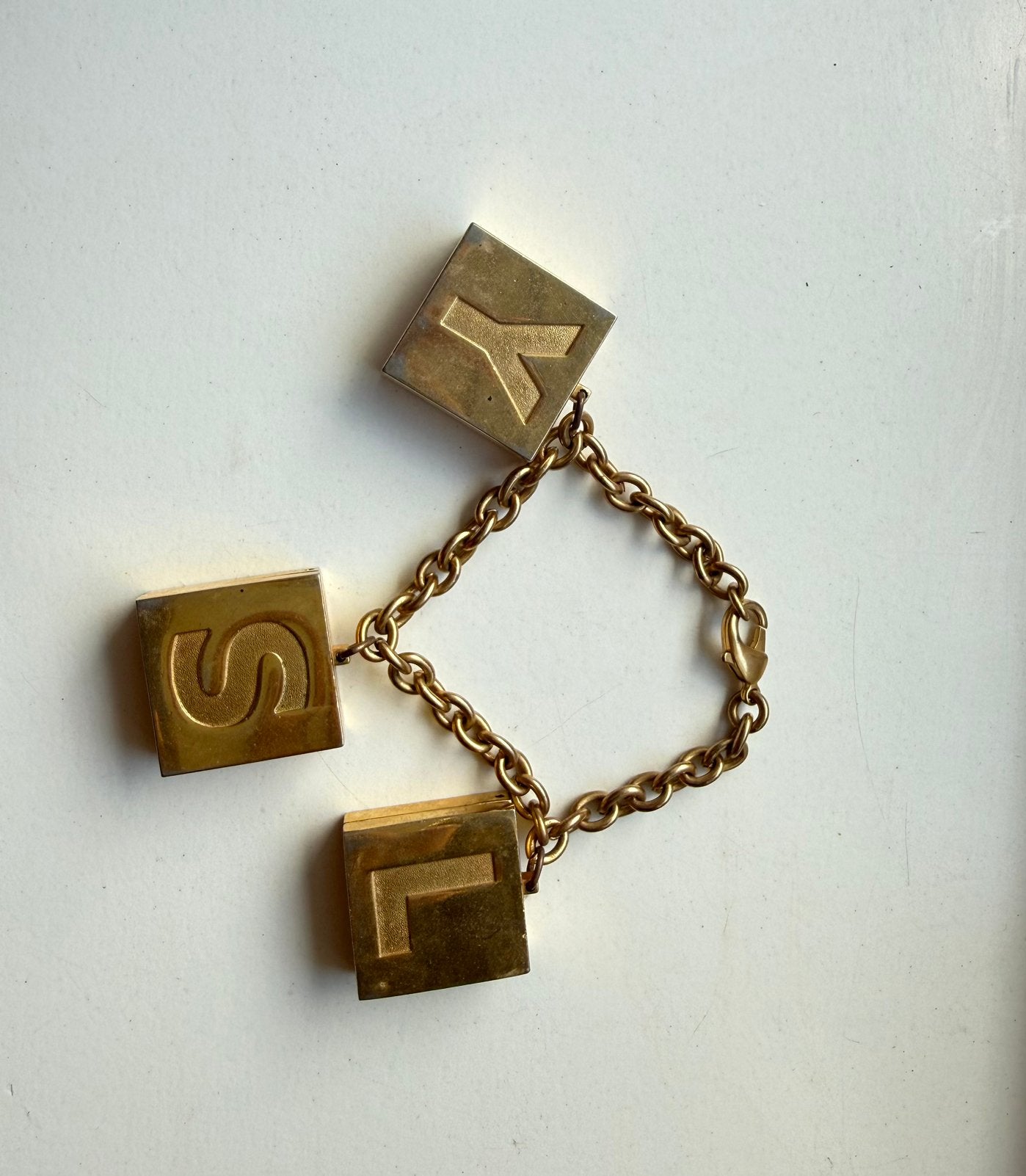 Yves Saint Laurent make-up armband, Sieraden, Tassen en Uiterlijk, Armbanden, Ophalen of Verzenden, Gebruikt, Goud