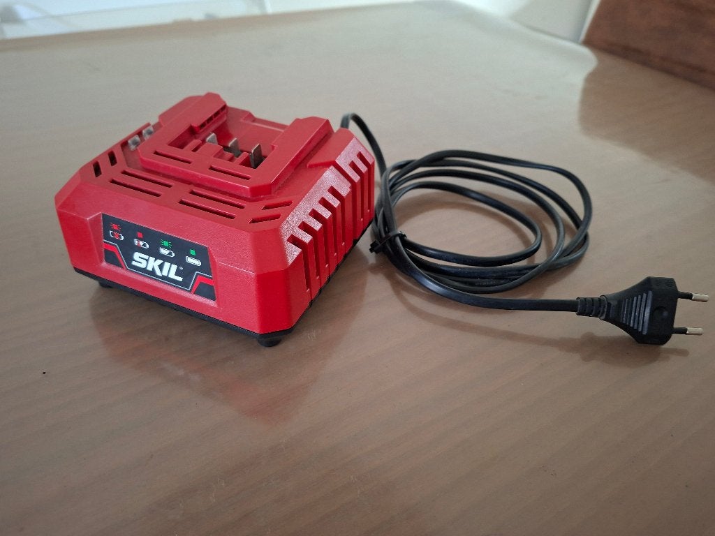 Originele SKIL  20V acculader, Ophalen of Verzenden, Gebruikt