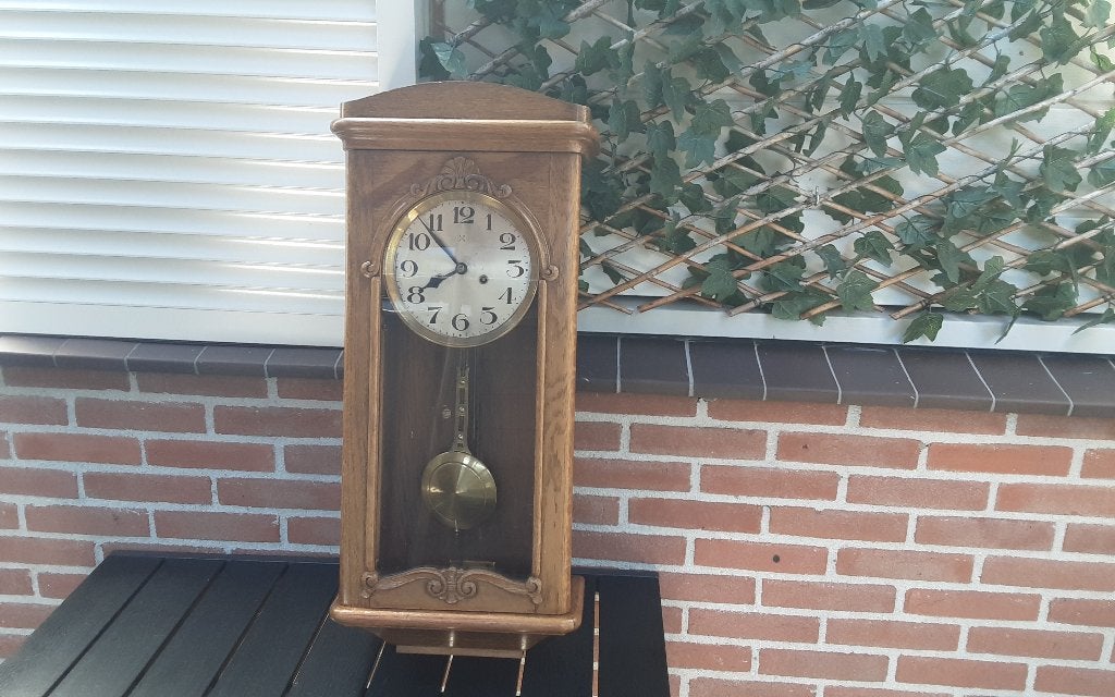 Antieke wandklok, Ophalen