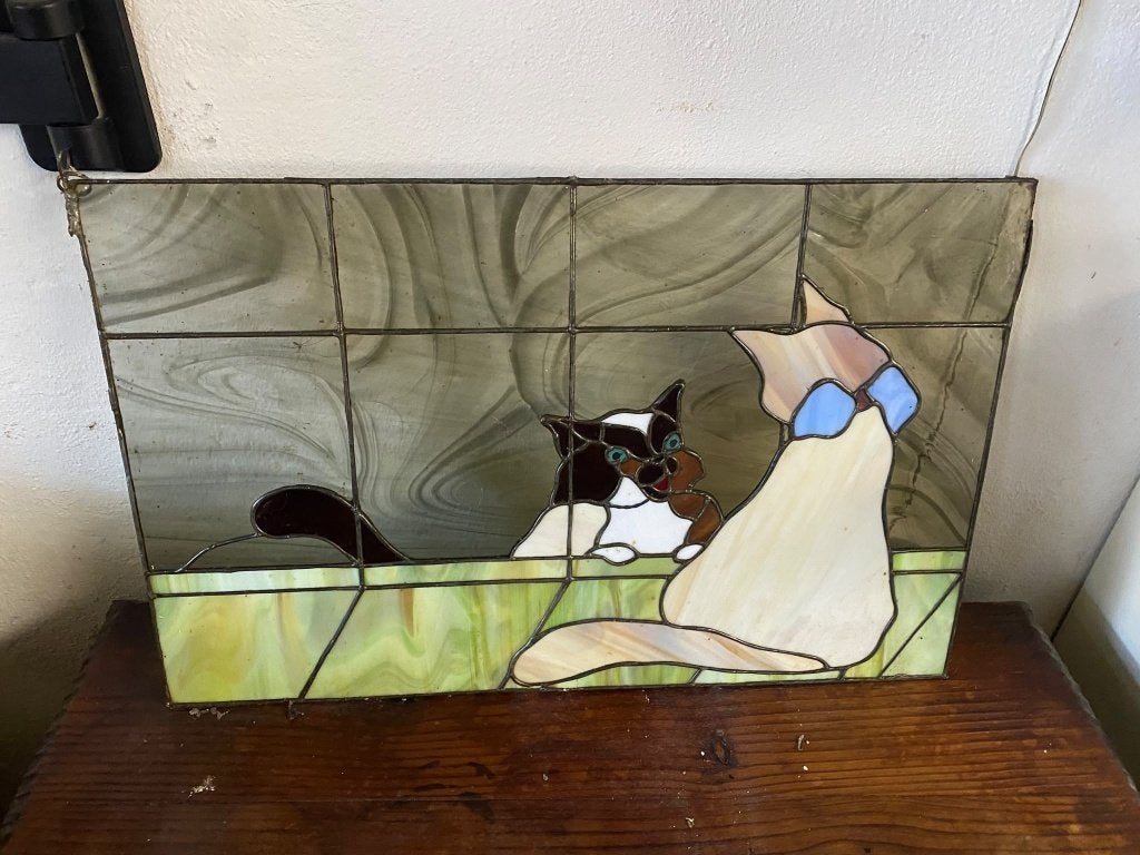 Glas in lood kat raamdecoratie, Ophalen