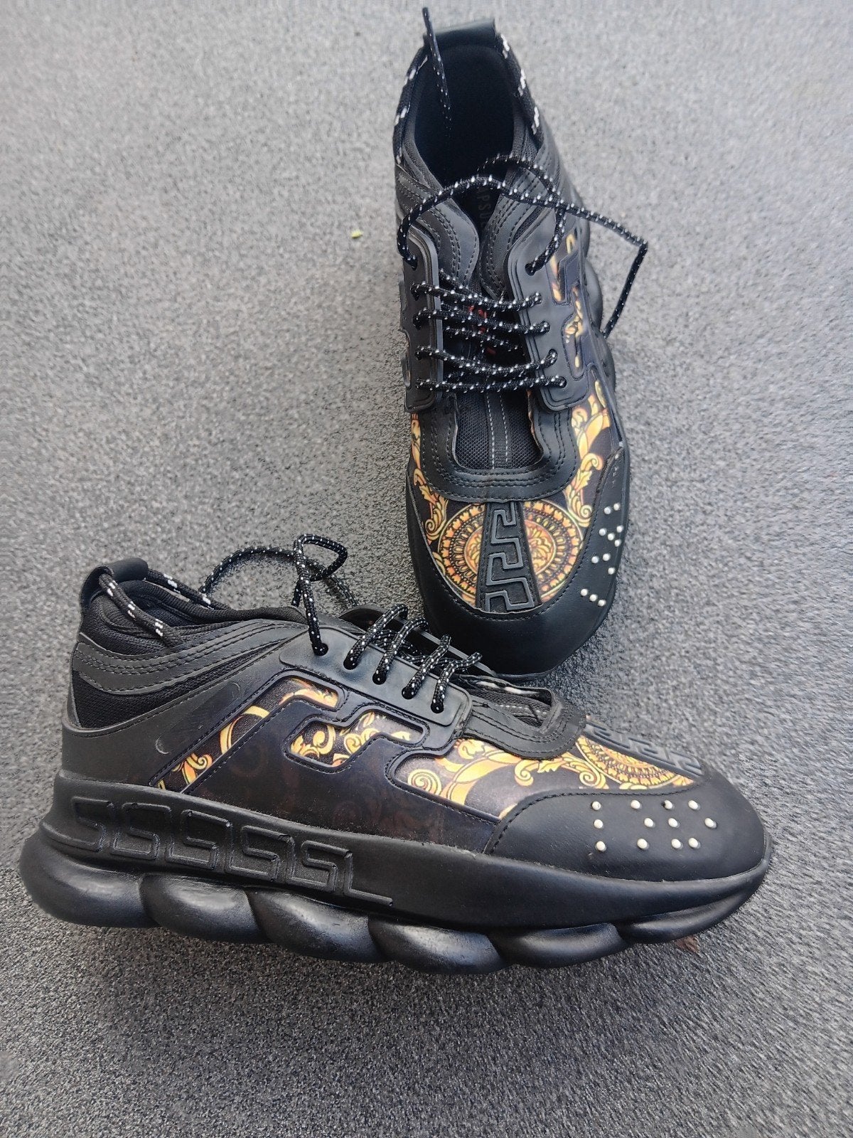 Versace Chain Reaction Stijlvolle zwarte sneakers met gouden, Ophalen, Zwart, Nieuw, Sneakers of Gympen