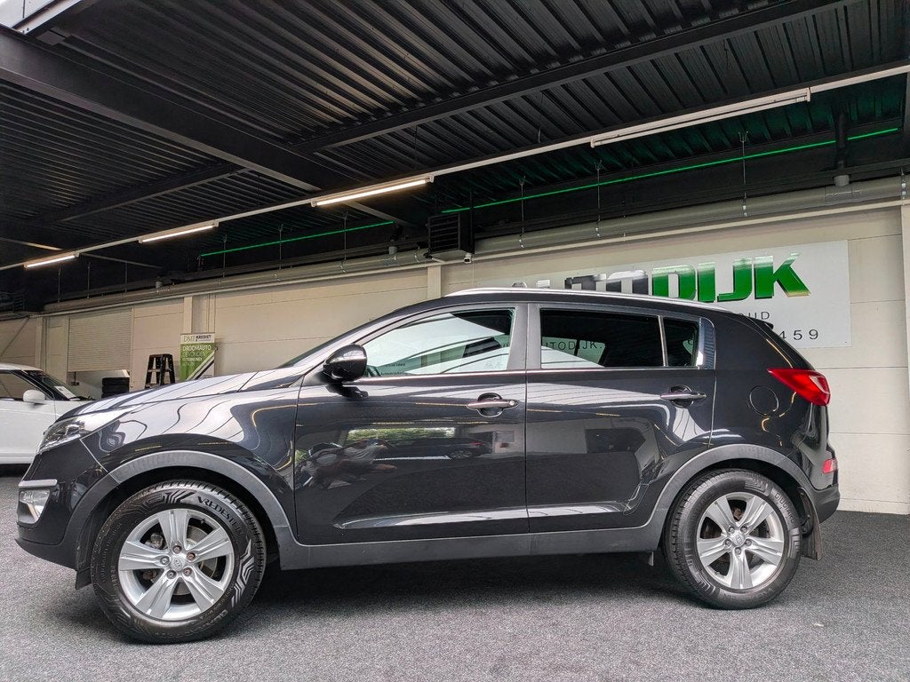 Kia Sportage 2.0 X-ecutive Plus Pack|Trekhaak|PDC|*Carplay, Auto's, Kia, Gebruikt, Zwart, 4 cilinders, Leder en Stof